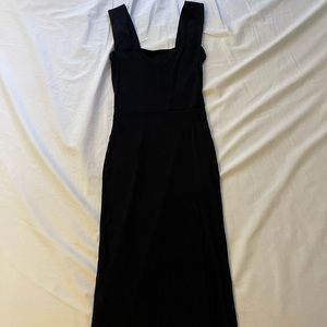 Black ribbed dress with a slit from Reformation